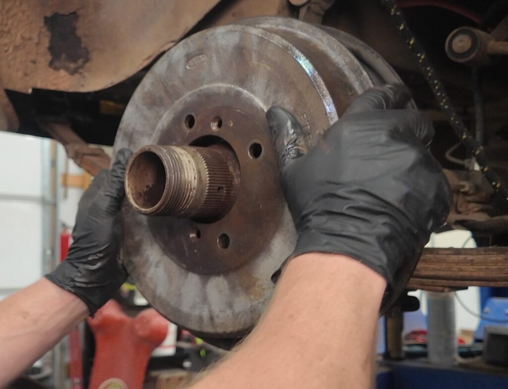 Installing rear brake drum on an MGB GT