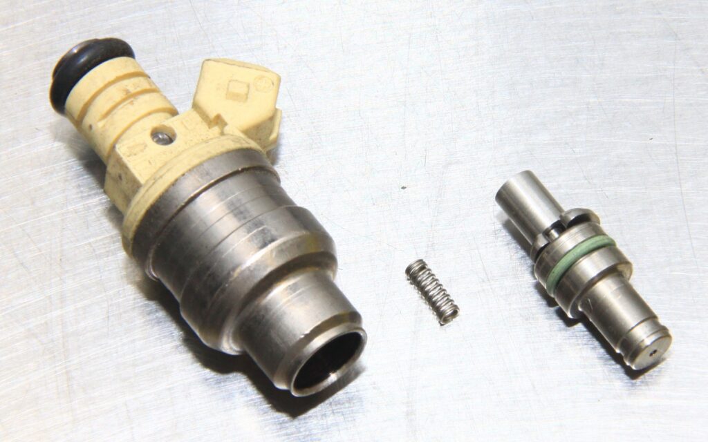 sum-fuel-injectors-ford-04-1024x640-1 EV1 fuel injector disassembled