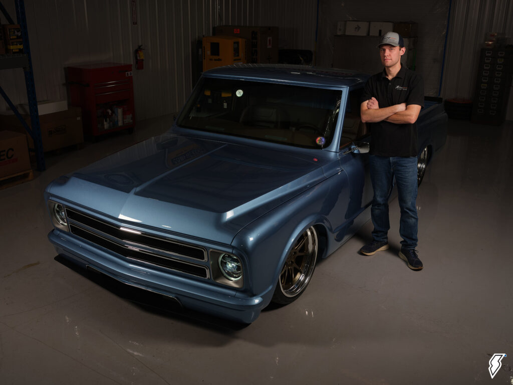 thomas_dickerson_c10_11-1024x768-1 man standing next to a custom chevy truck